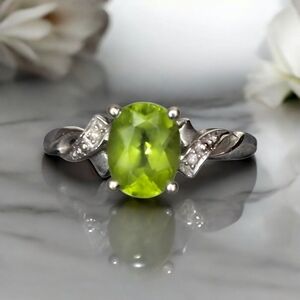 10K White Gold Natura Peridot Baguette Oval Gemstone Ring With Diamond Accent